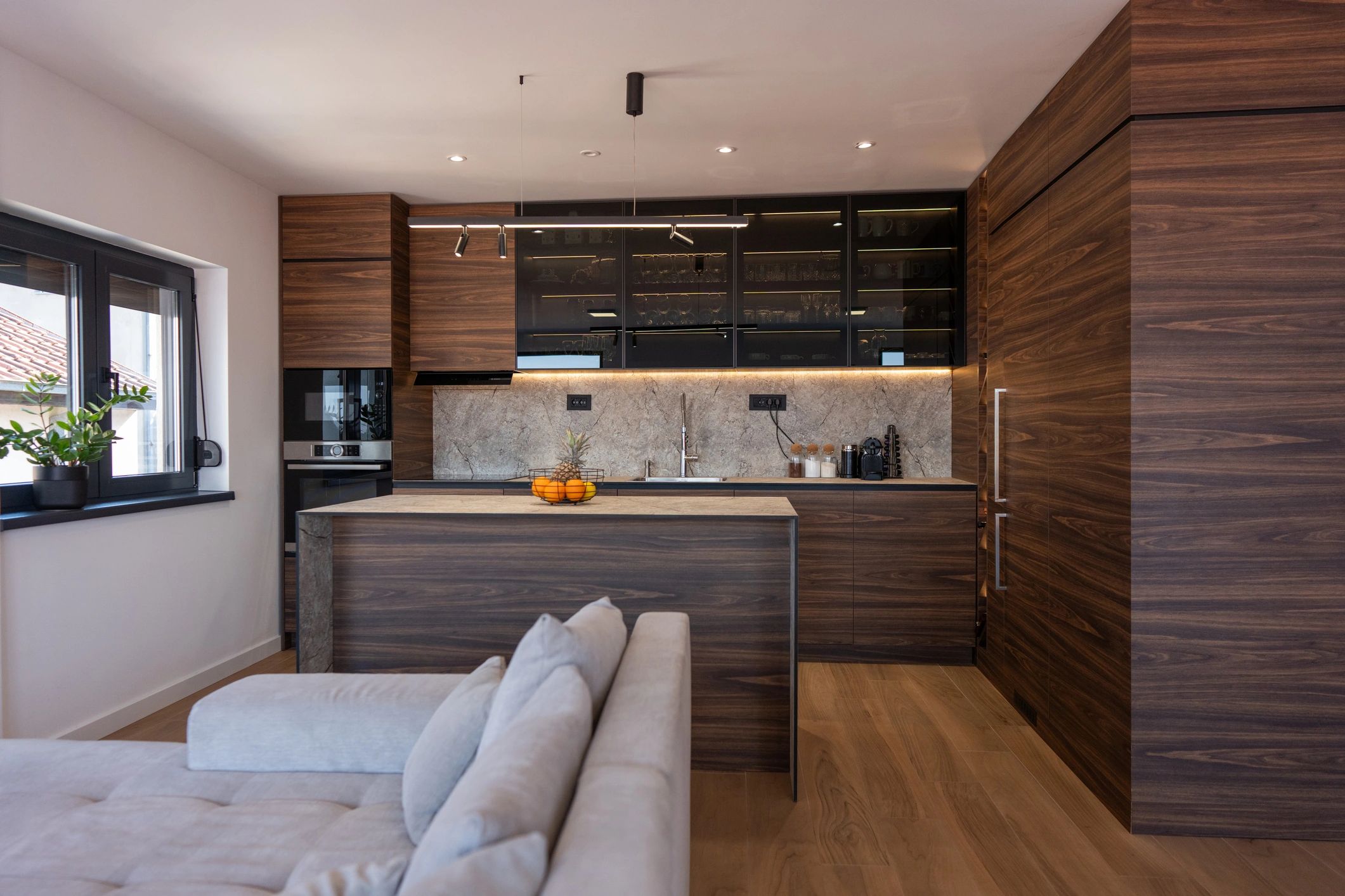 Modern interior with custom wood cabinetry and island